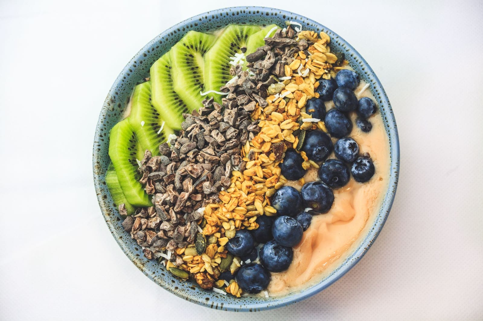 Overhead acai bowl loaded with toppings