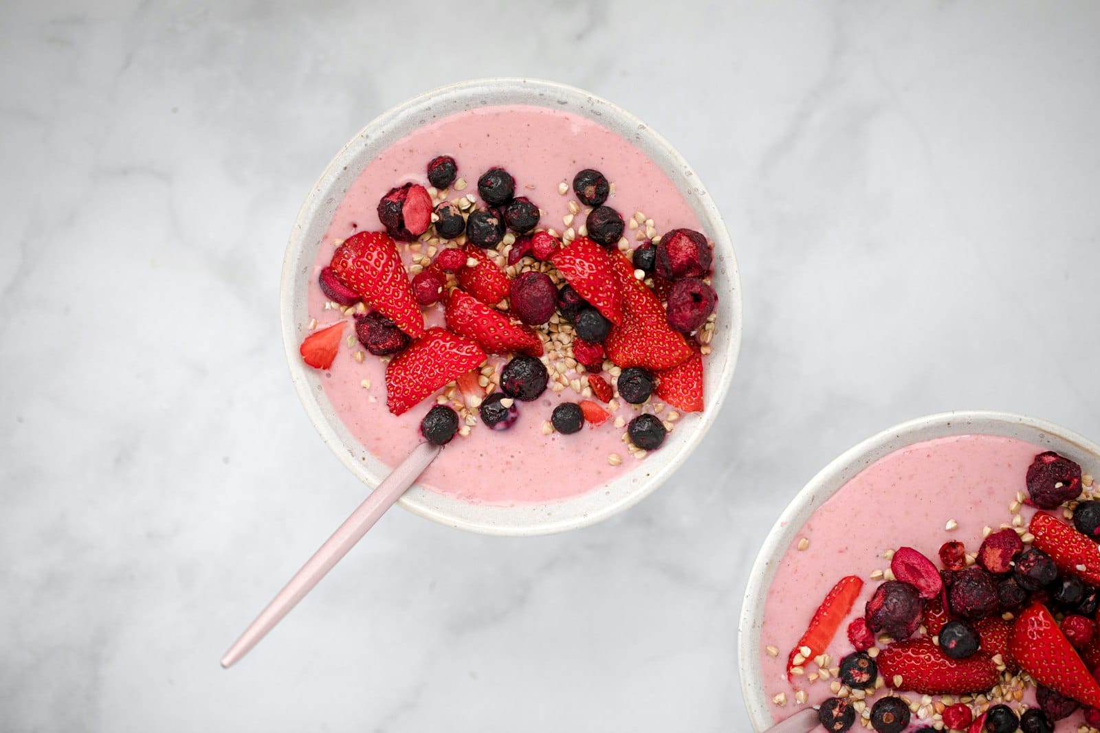 A thick blended acai base in a bowl