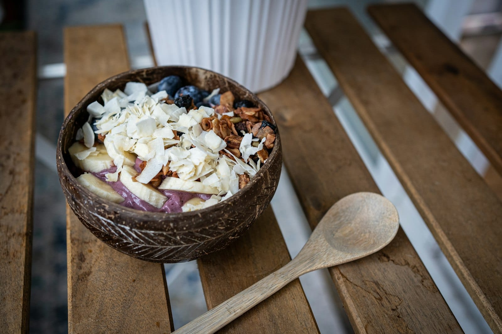 Eating an acai bowl with a spoon