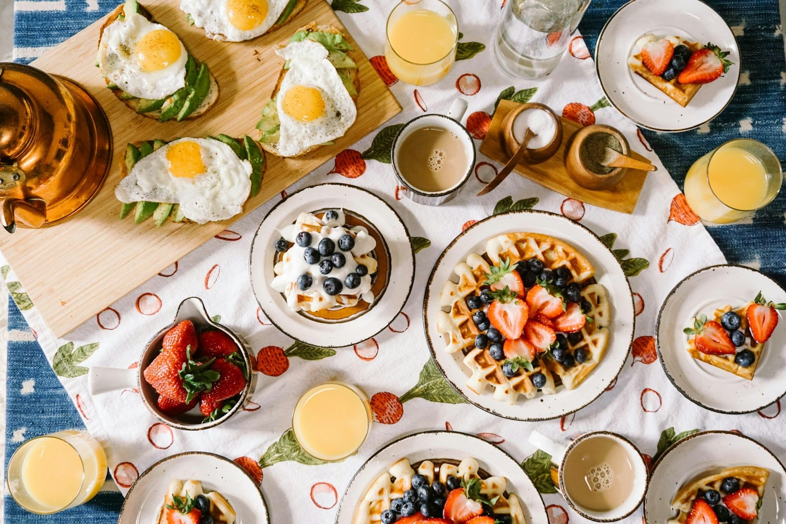 Shared brunch table spread at a Southport cafe