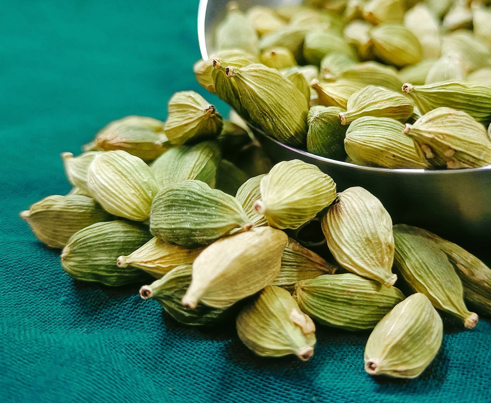 Green cardamom pods, a fragrant spice