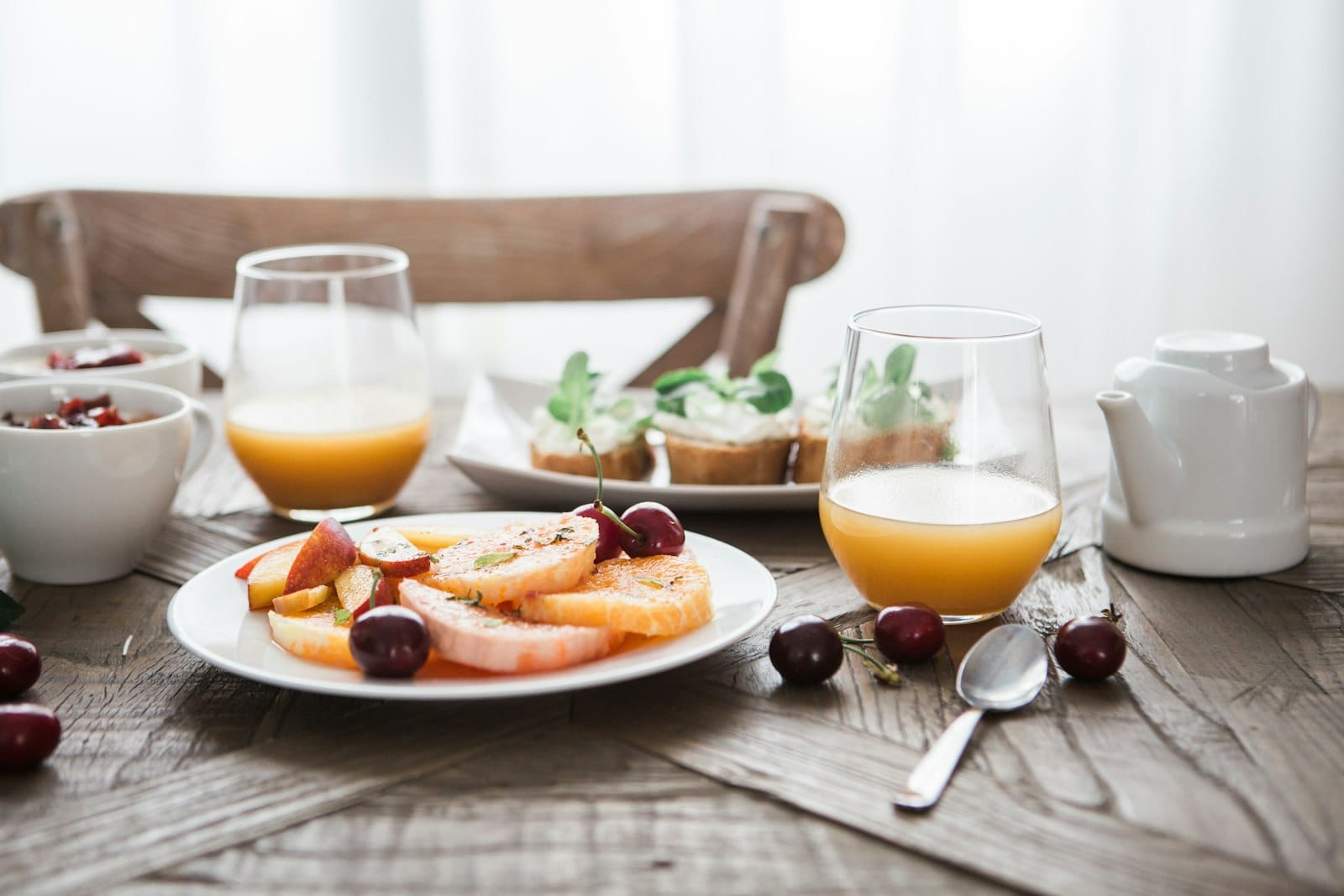 A spread of easy vegan breakfast dishes on a table