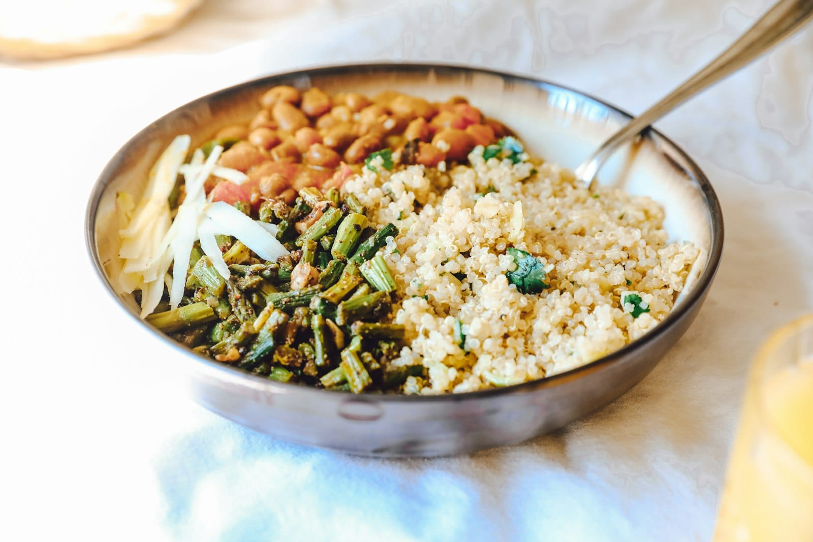 Gluten-free nourish bowl with grains and roasted vegetables