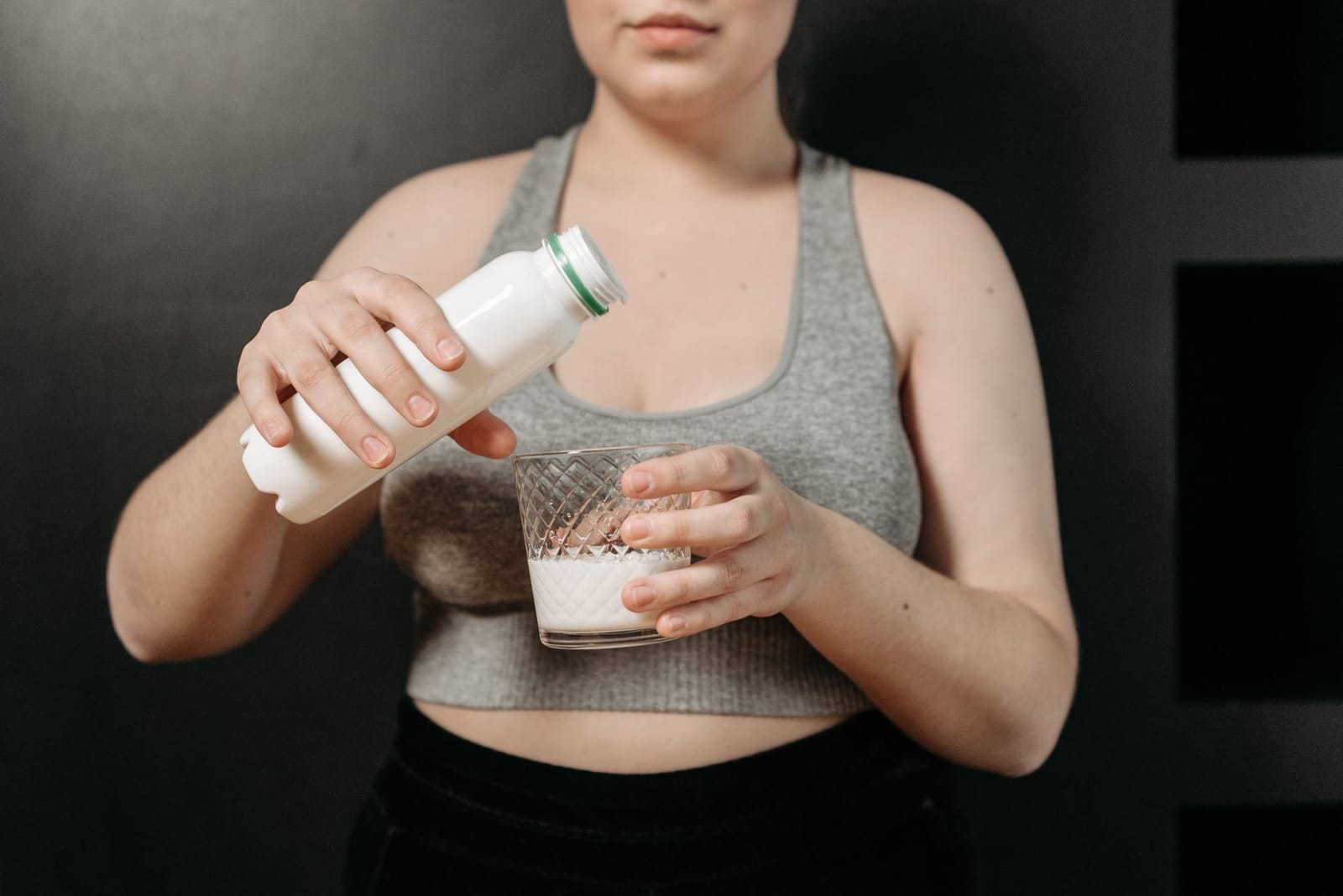 Plant milk being poured into a smoothie