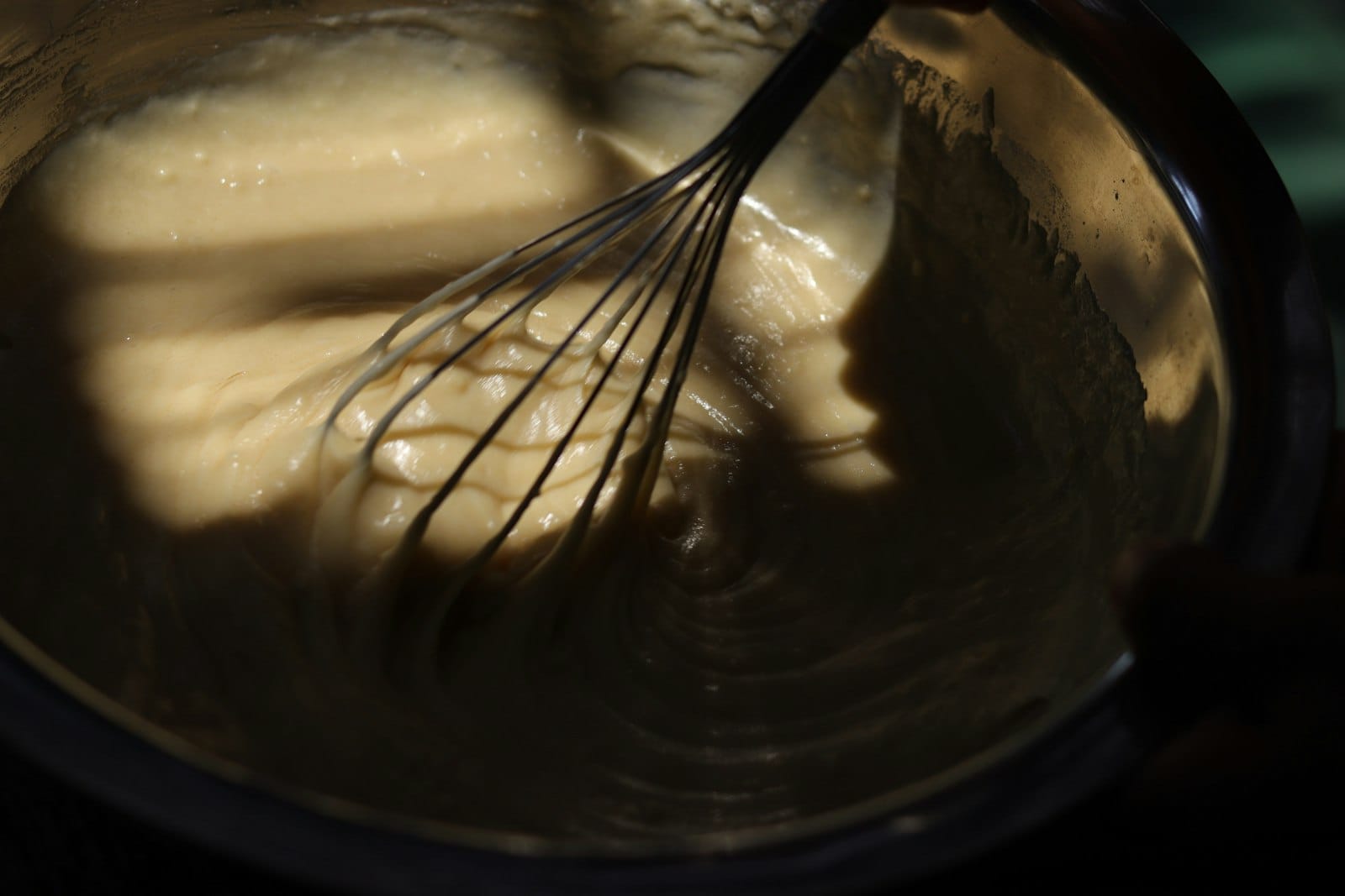 Vegan pancake batter in a mixing bowl