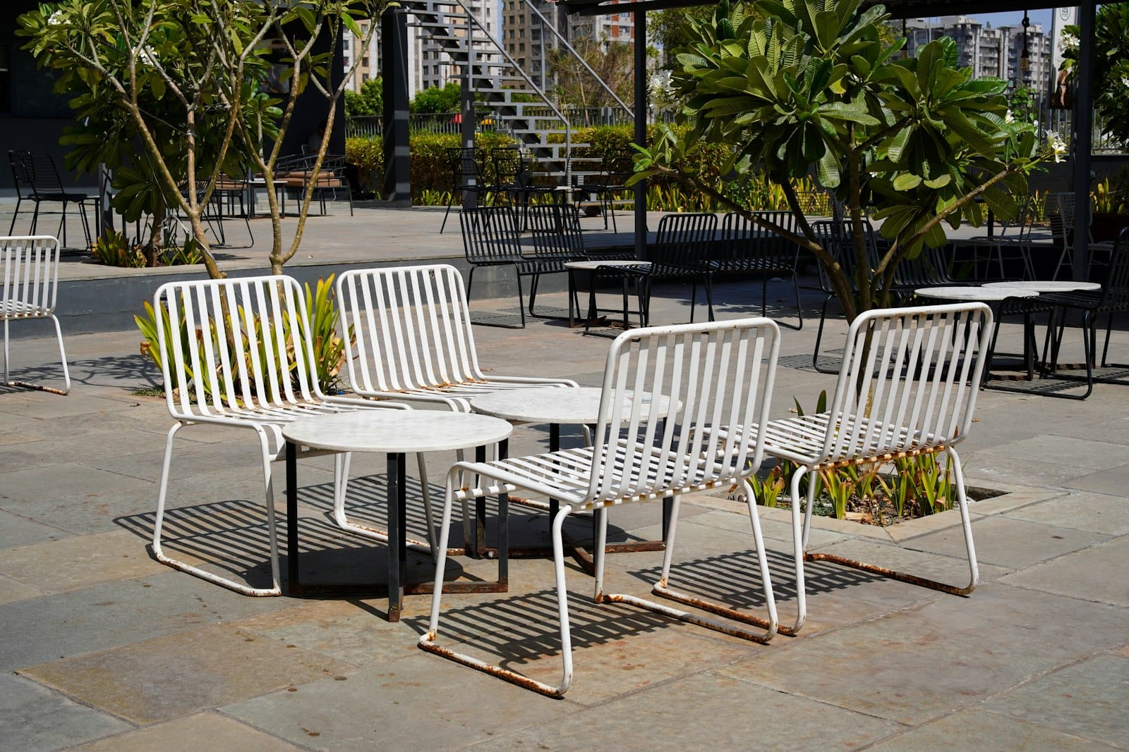 Leafy outdoor cafe courtyard seating in Southport