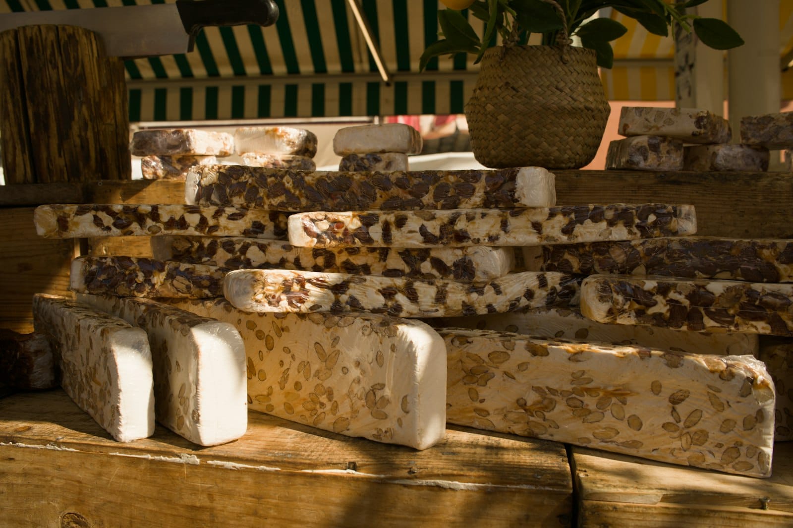 A block of tempeh, part sliced