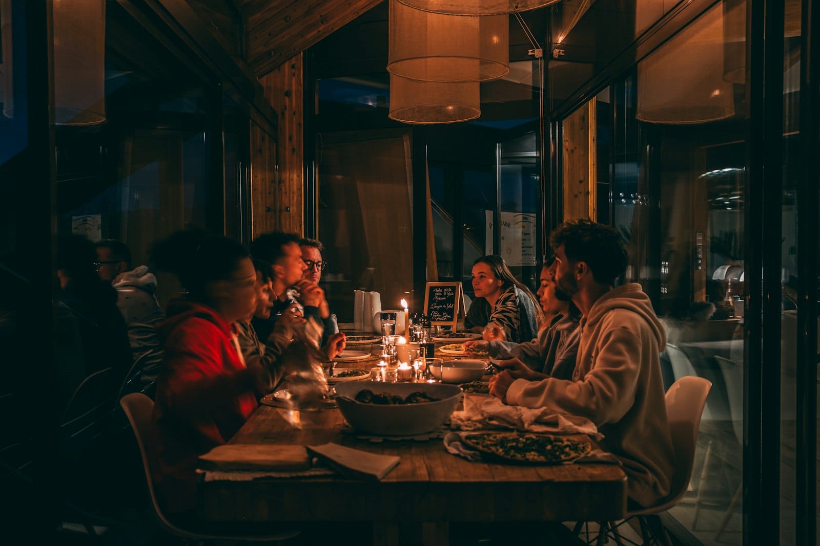 Friends sharing a plant-based meal at a restaurant