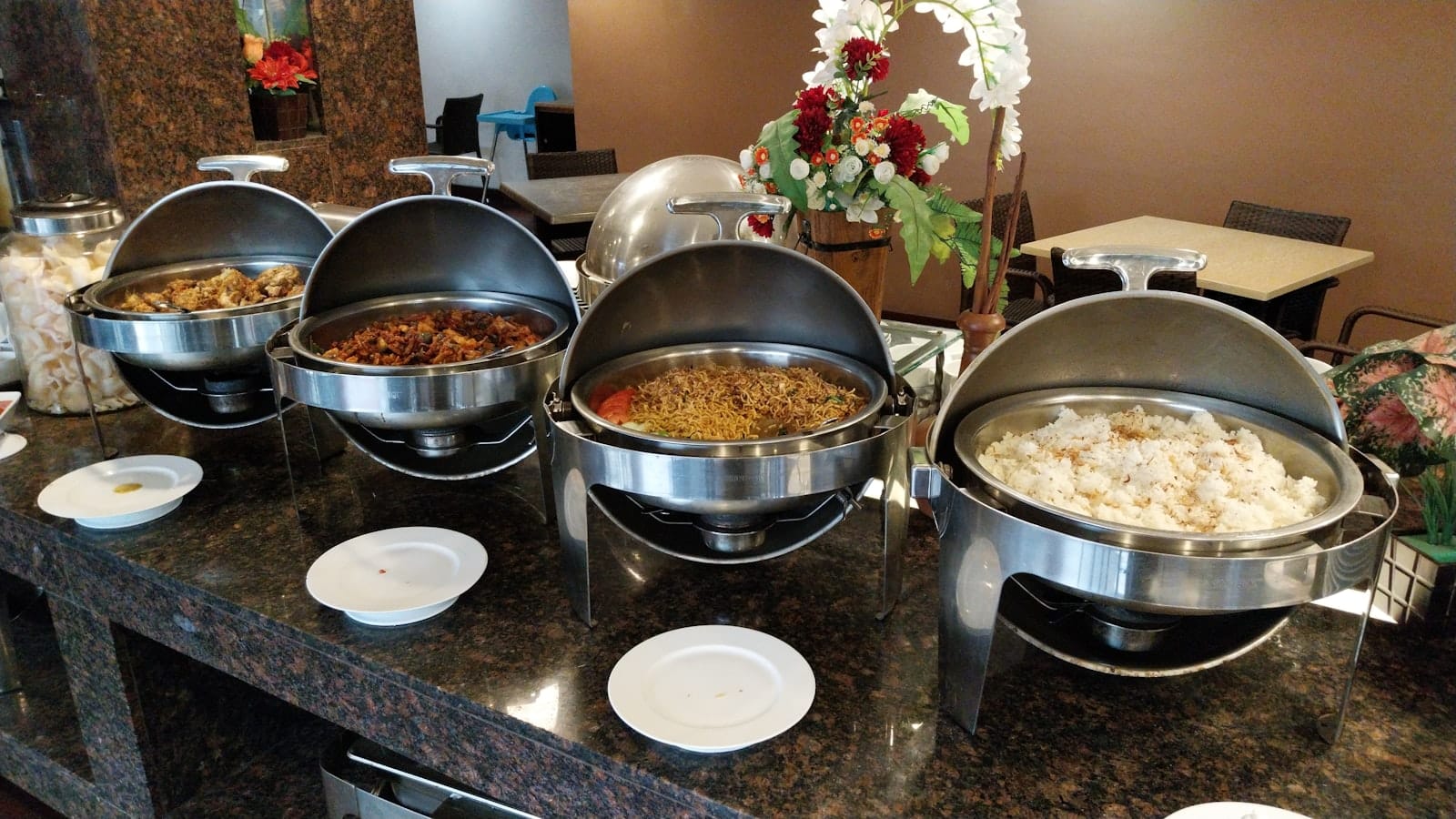 Vegetarian spread of curries, rice and sides