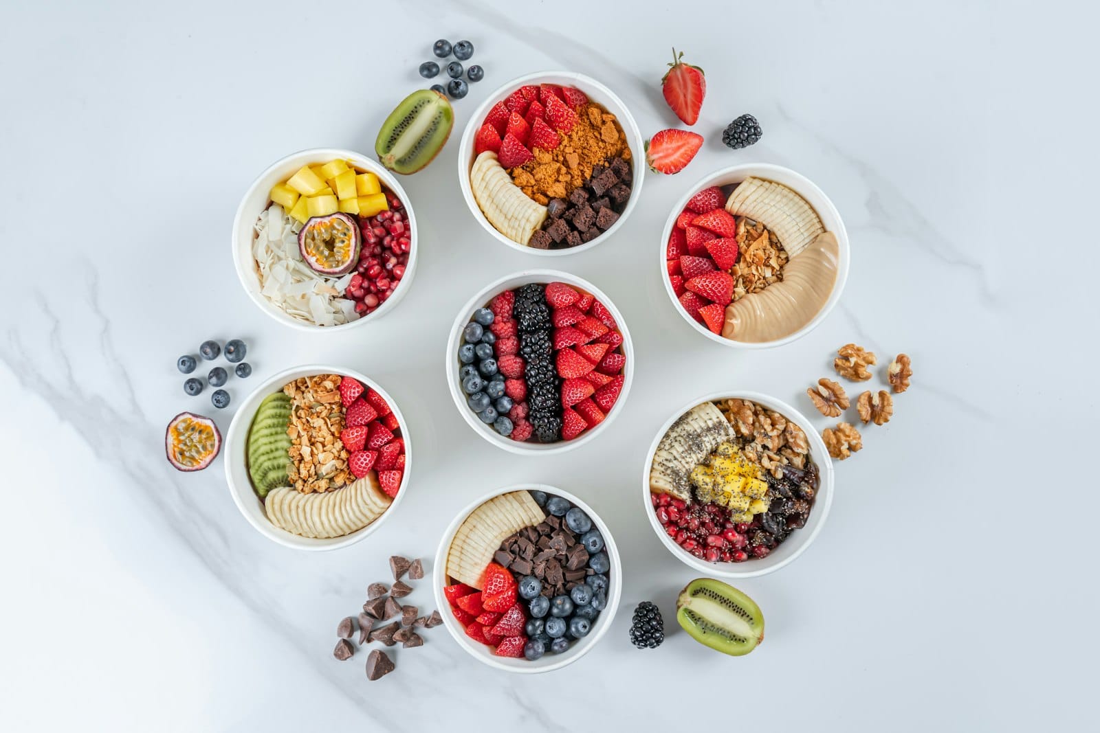 Acai bowl toppings including coconut and banana