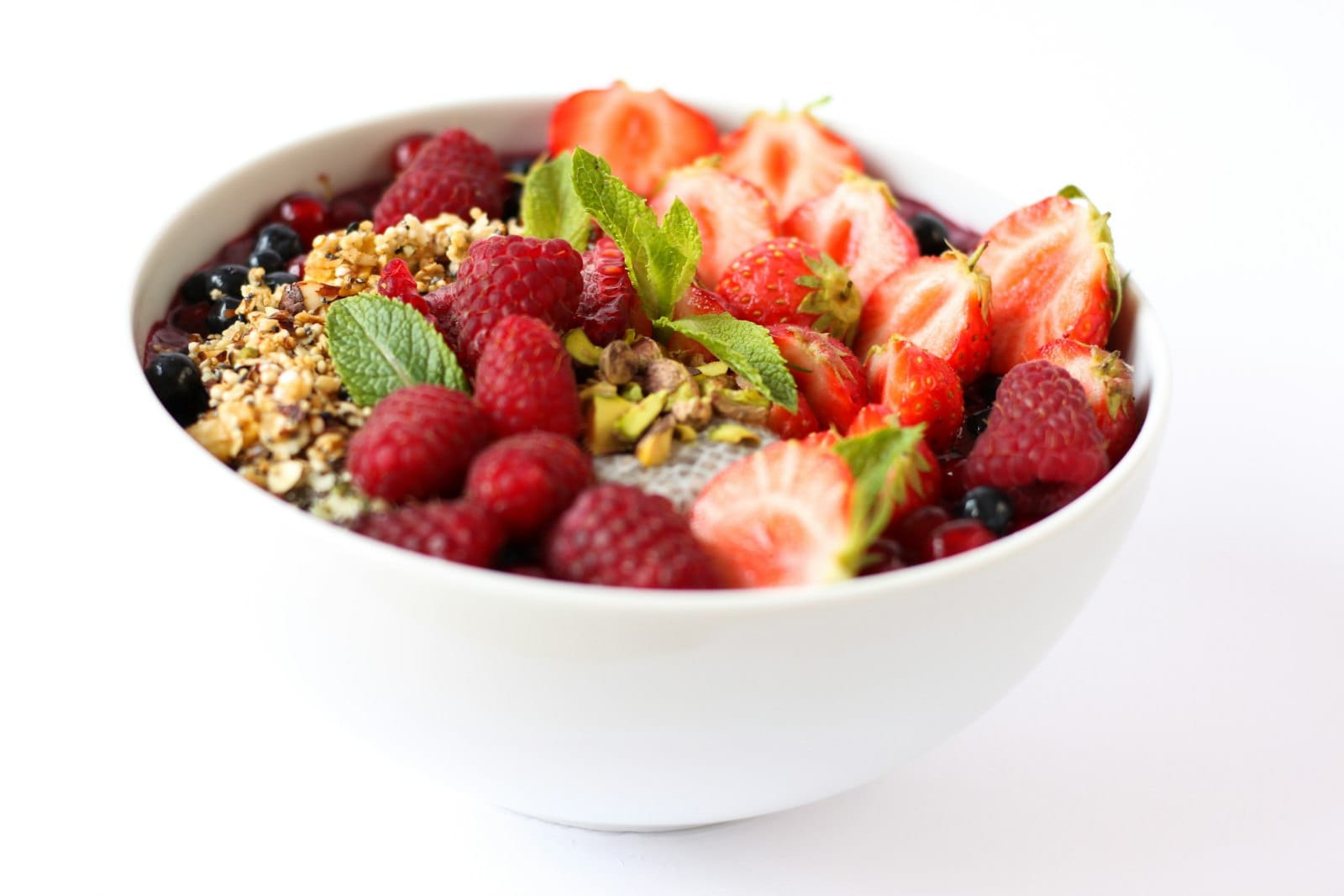 A bowl of oatmeal with fresh fruit
