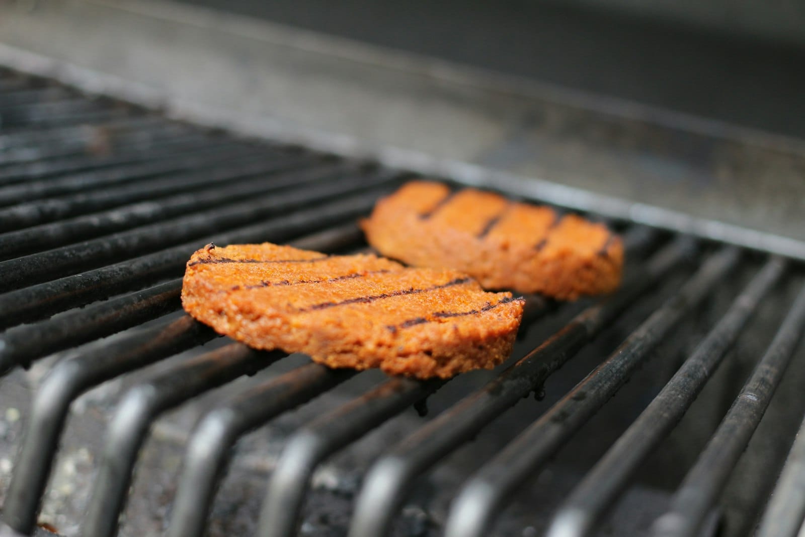 A grilled plant-based burger patty