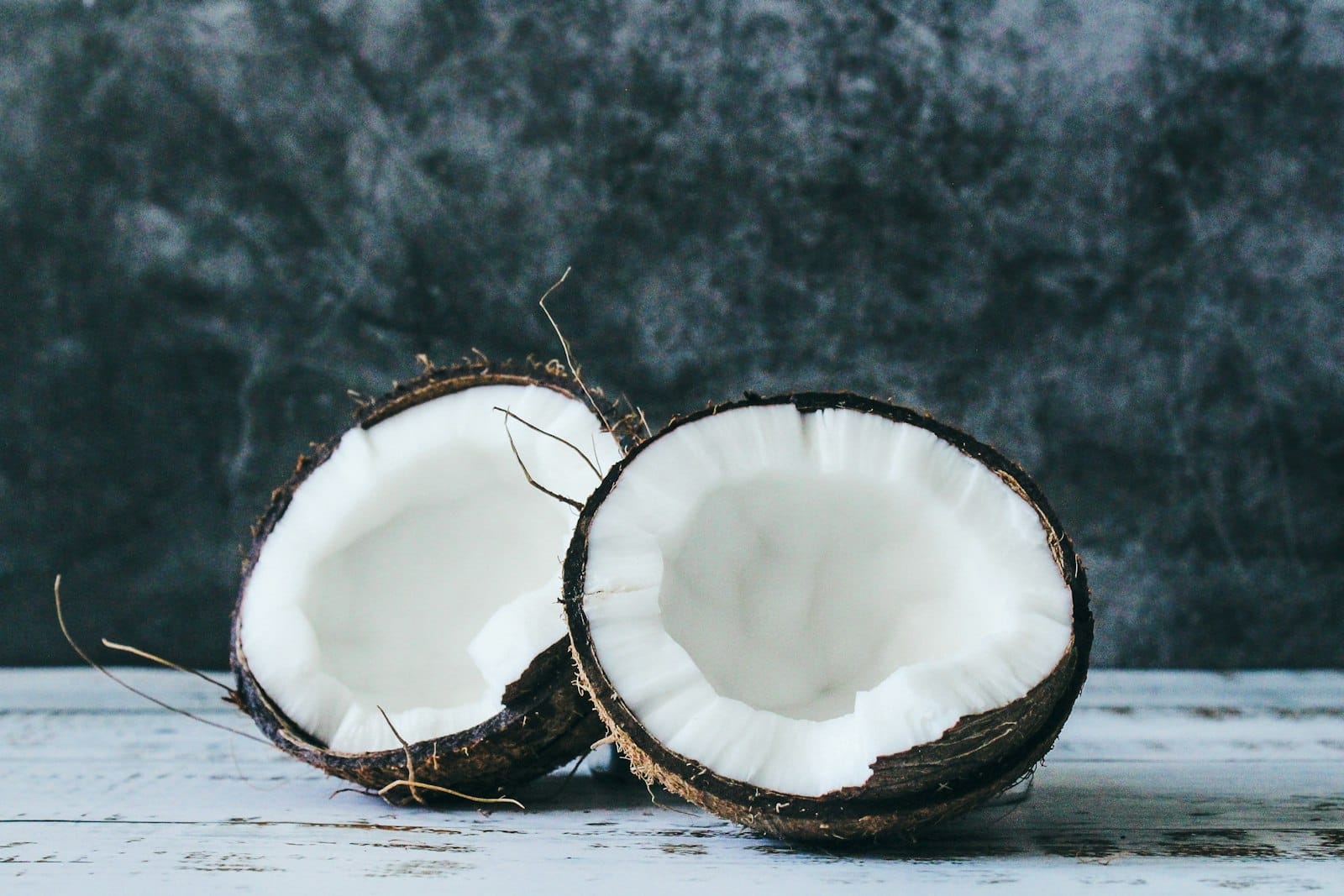A fresh halved coconut