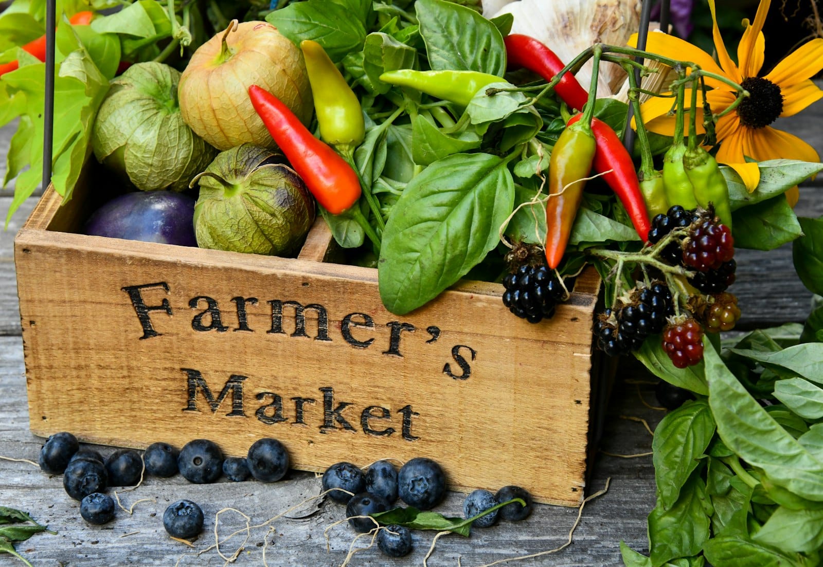Fresh produce at a farmers market stall