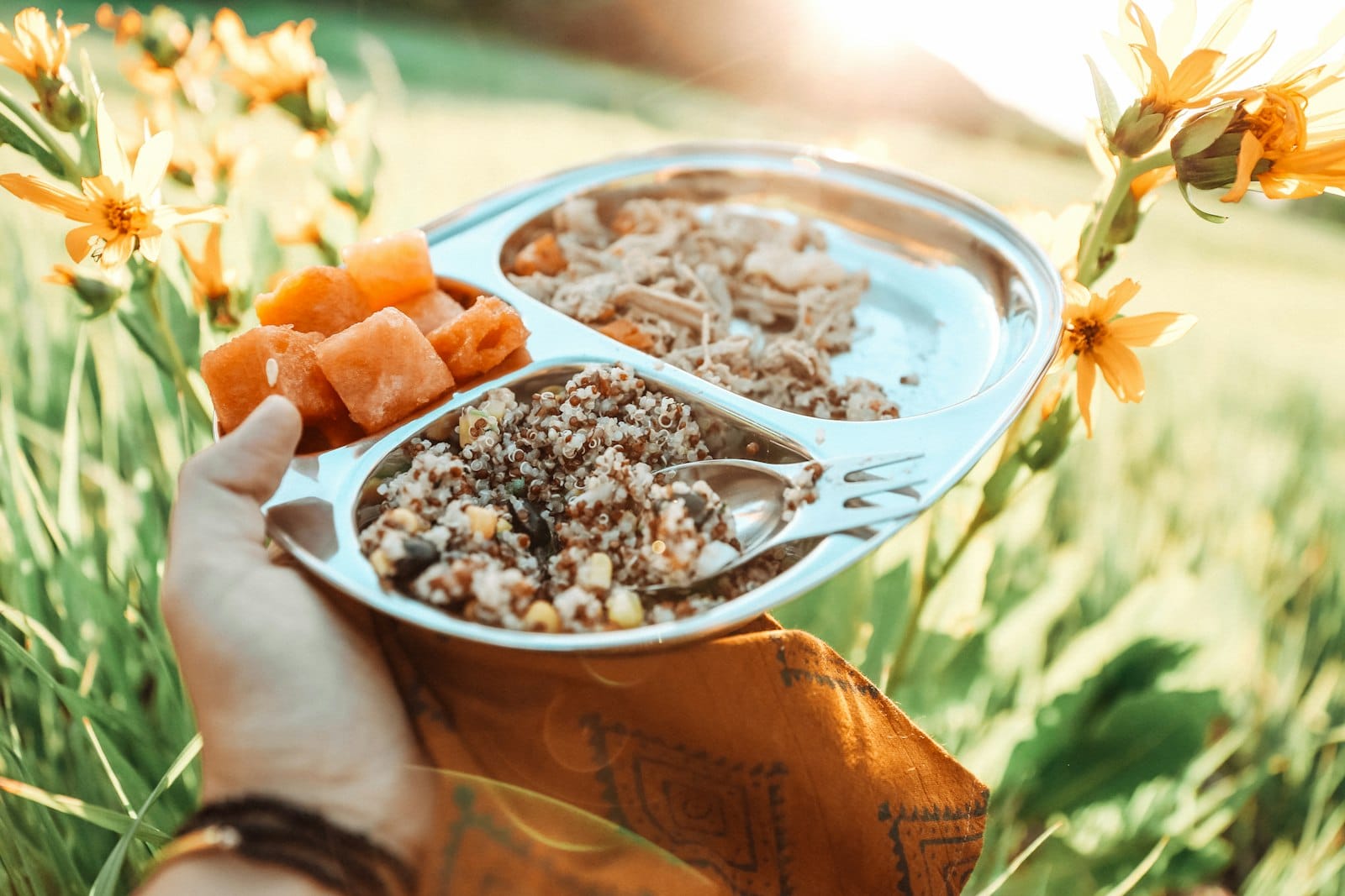 A vegan meal plate with beans and grains