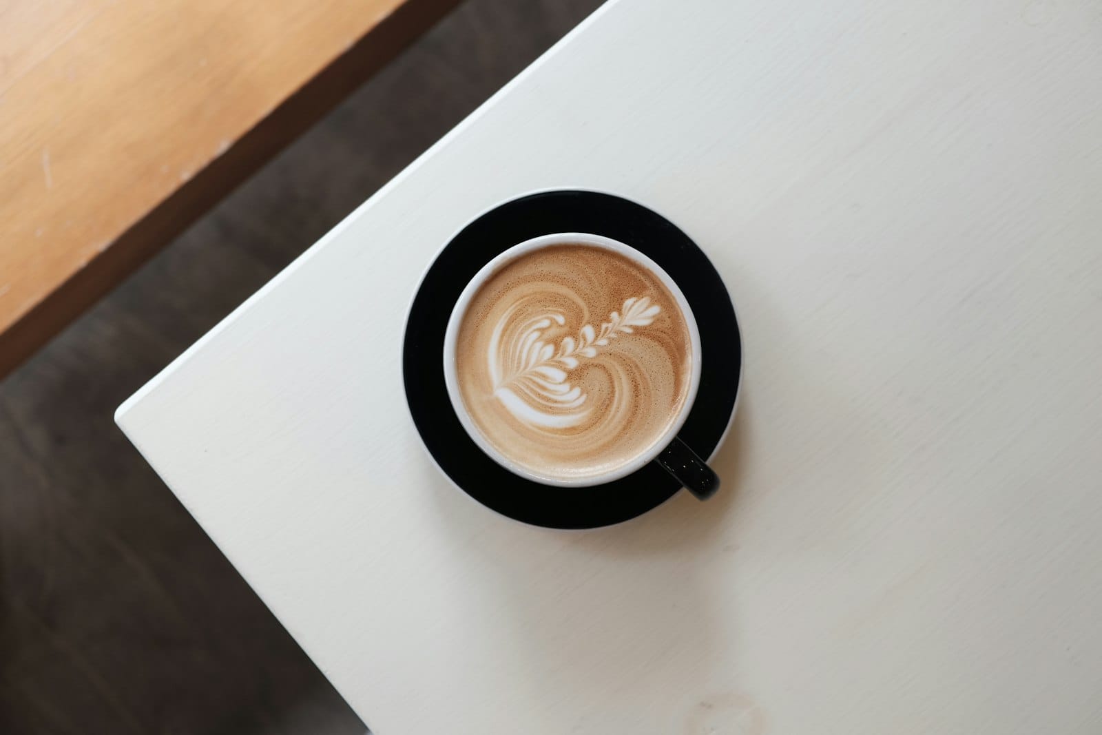 A coffee cup on a cafe table