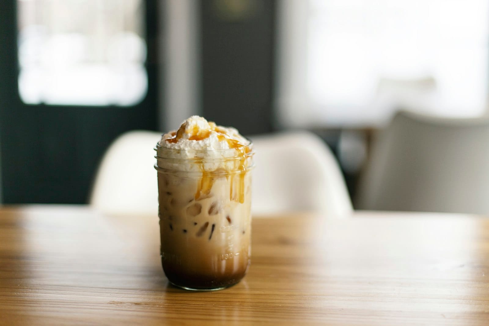 An iced golden latte in a glass