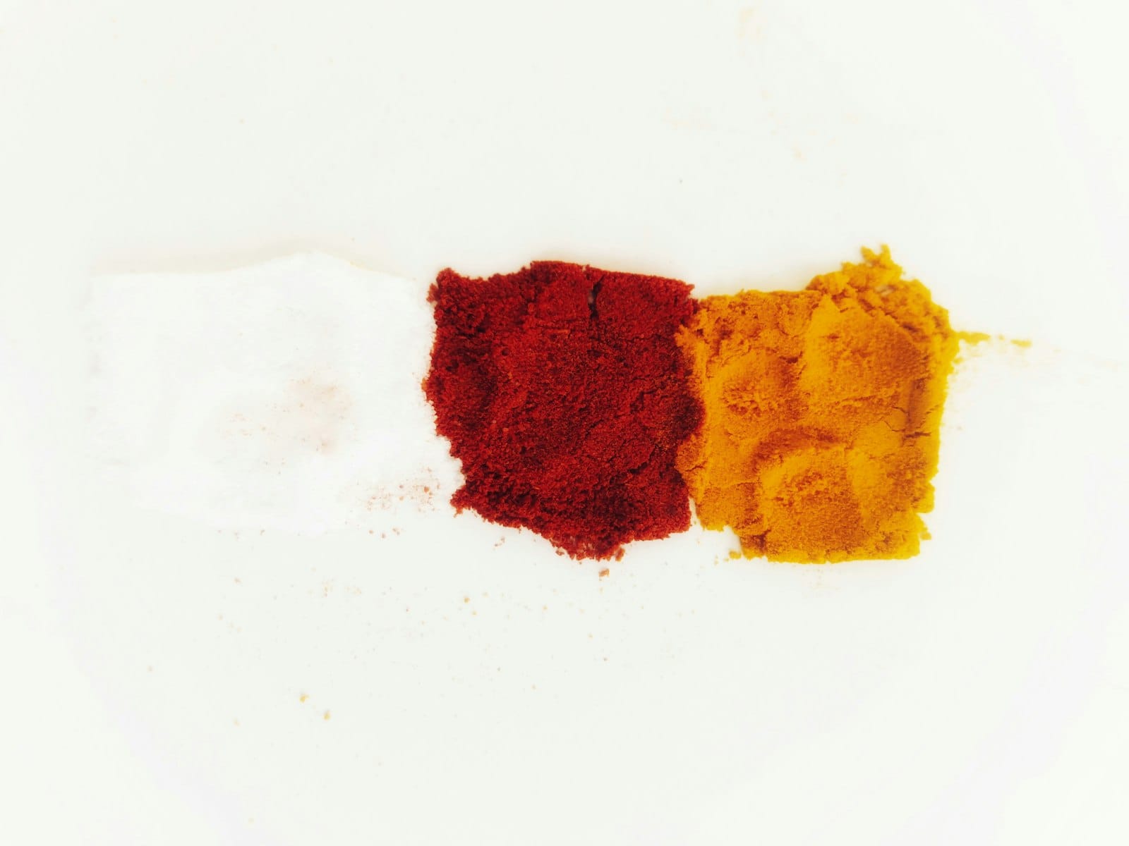 A flat lay of turmeric and spice ingredients