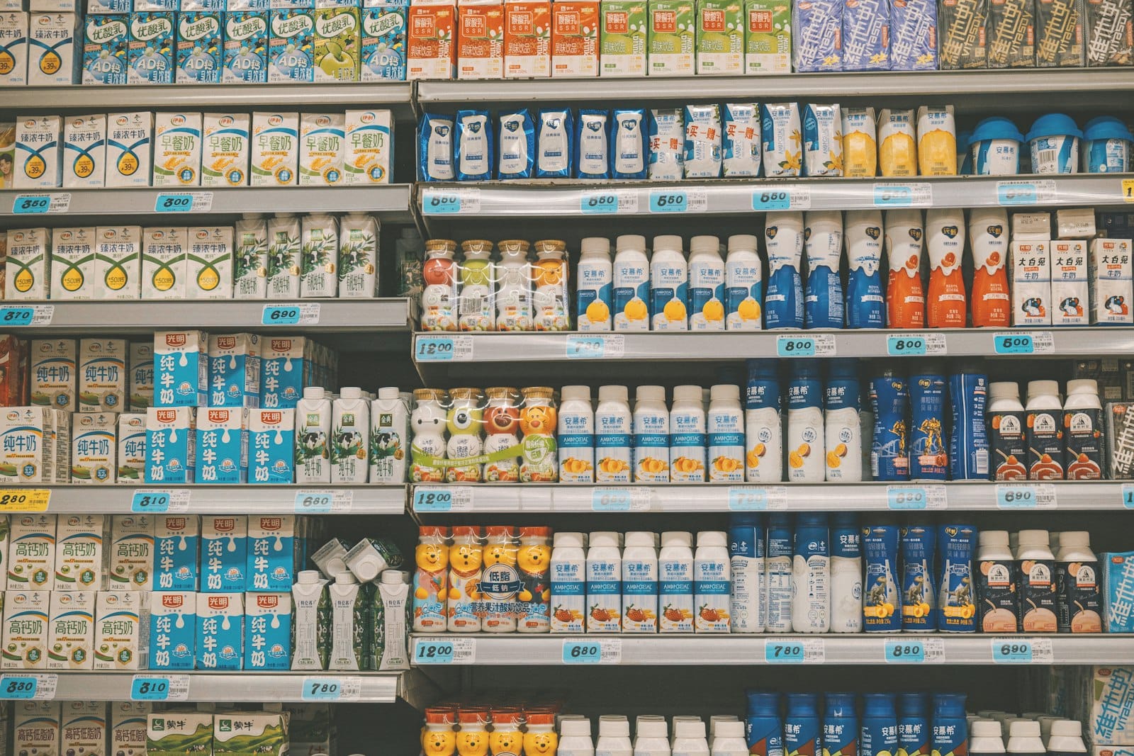 A selection of plant milk cartons on a shelf