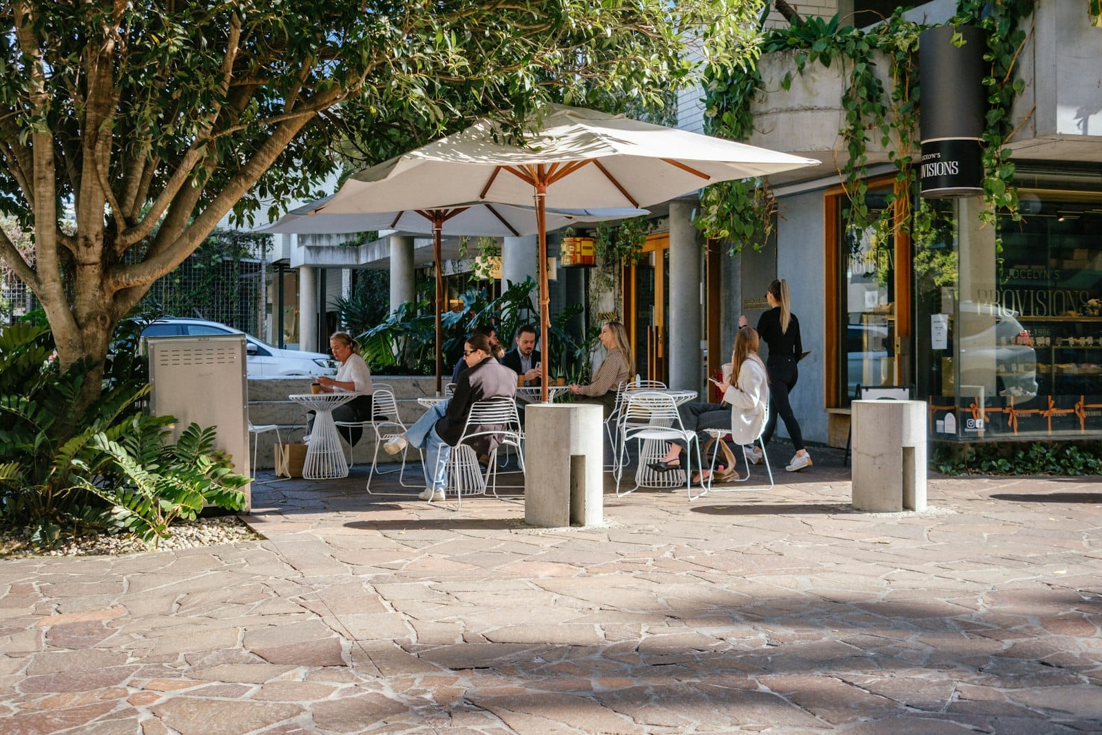 Friends dining outdoors at a cafe