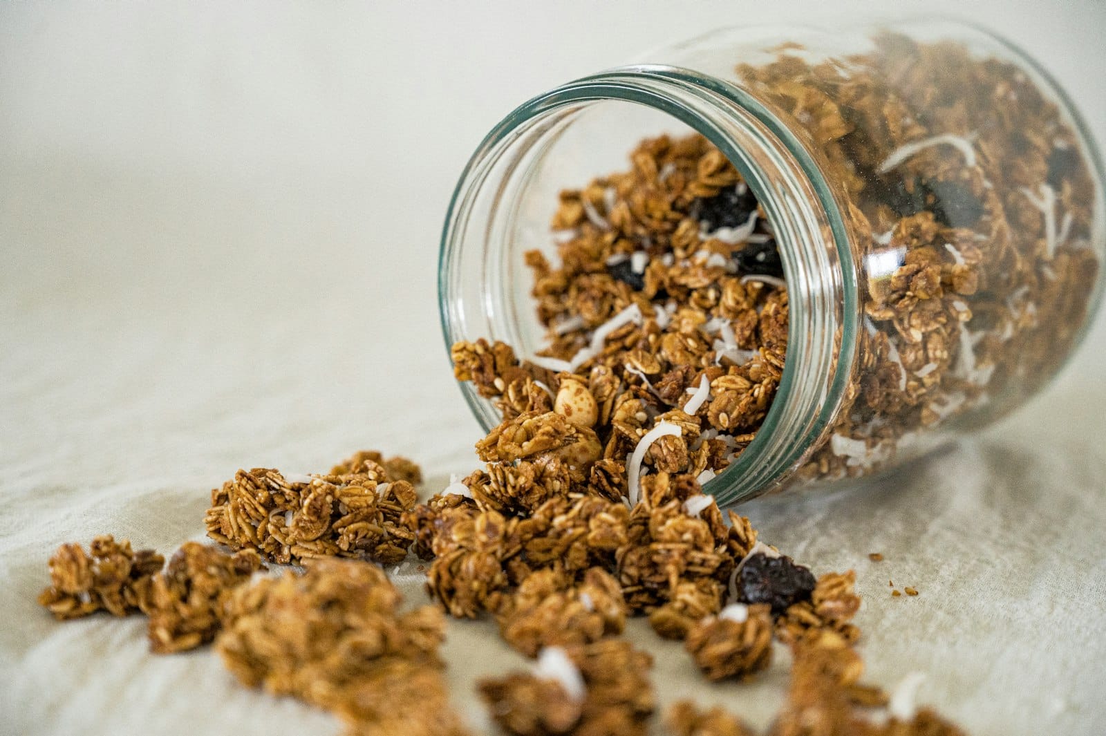 A jar of granola with seeds