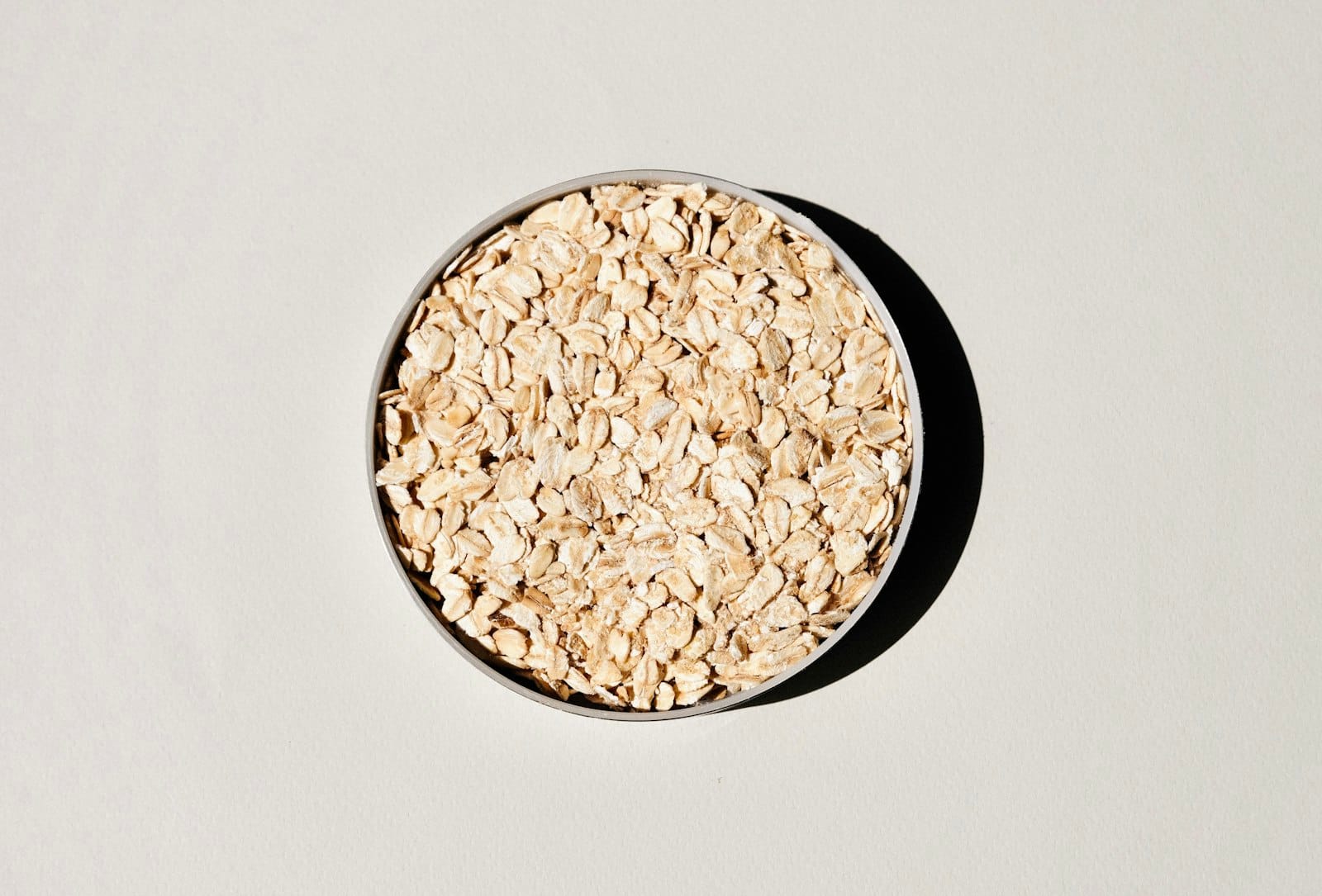 A bowl of oatmeal with seeds