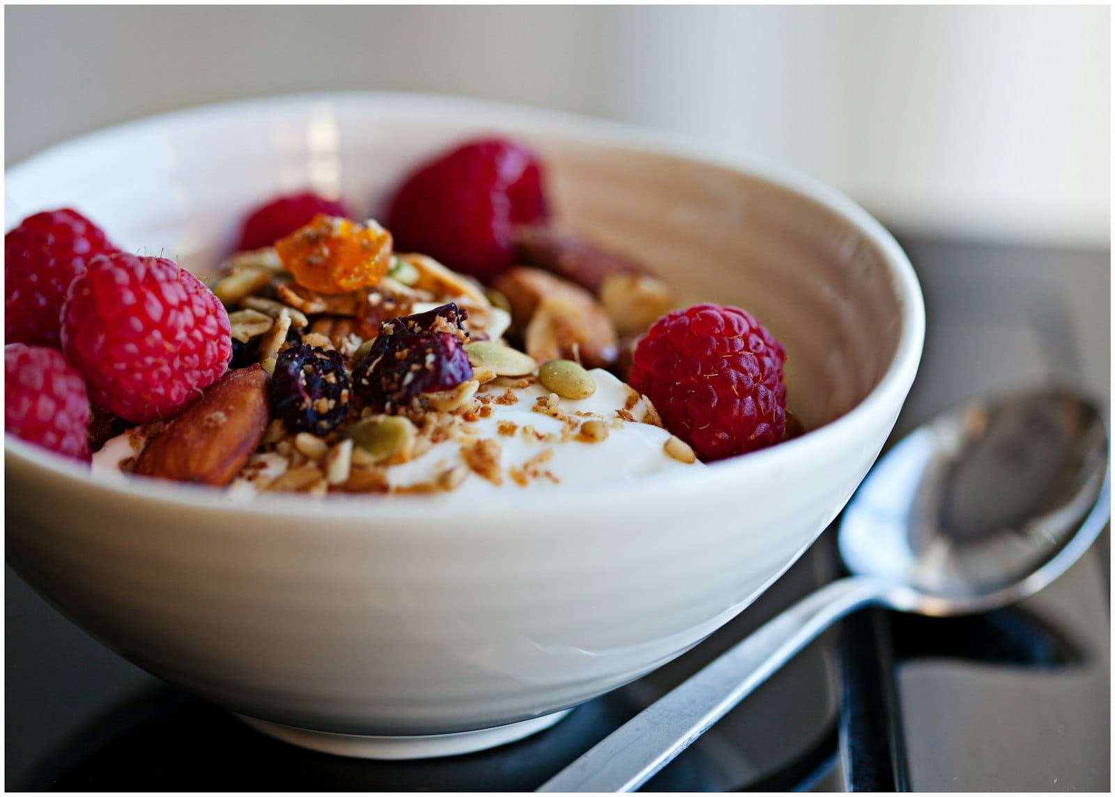 A bowl of plant-based yogurt with seeds
