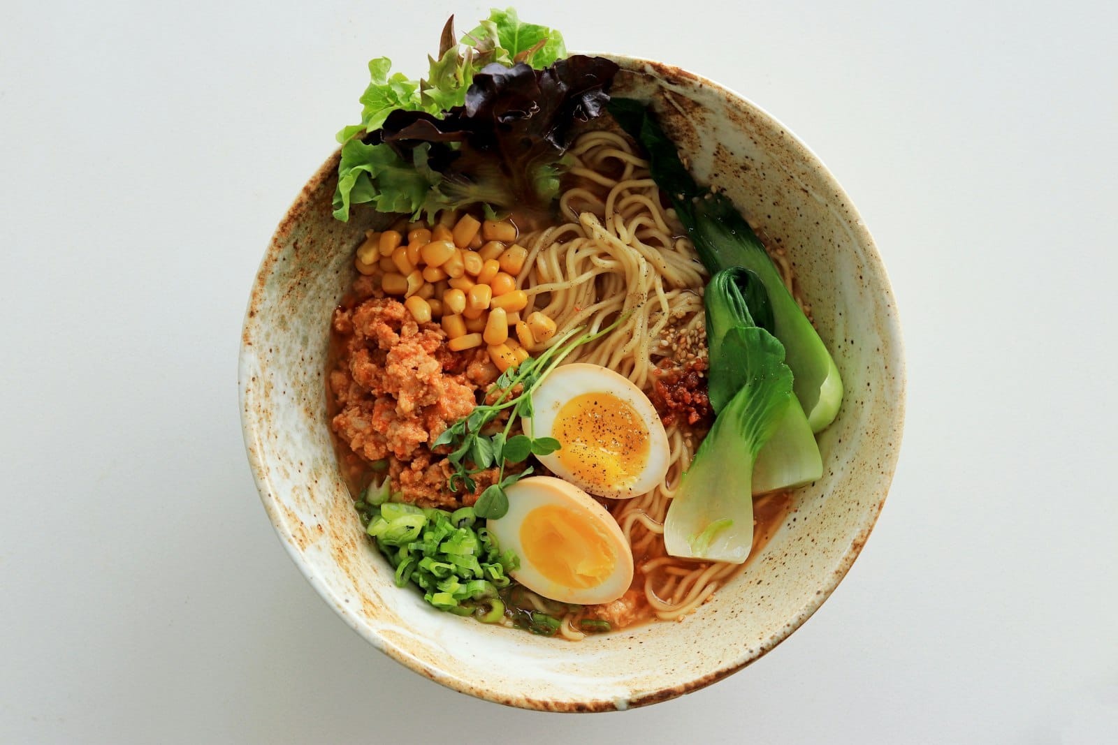 A ramen bowl with vegetables