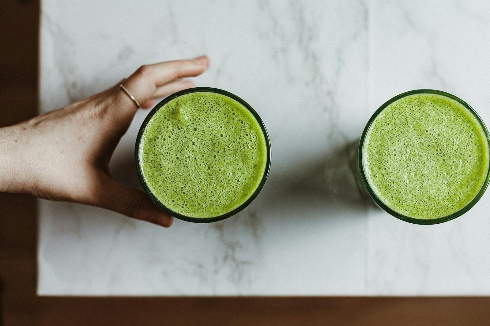 A green smoothie bowl with spinach