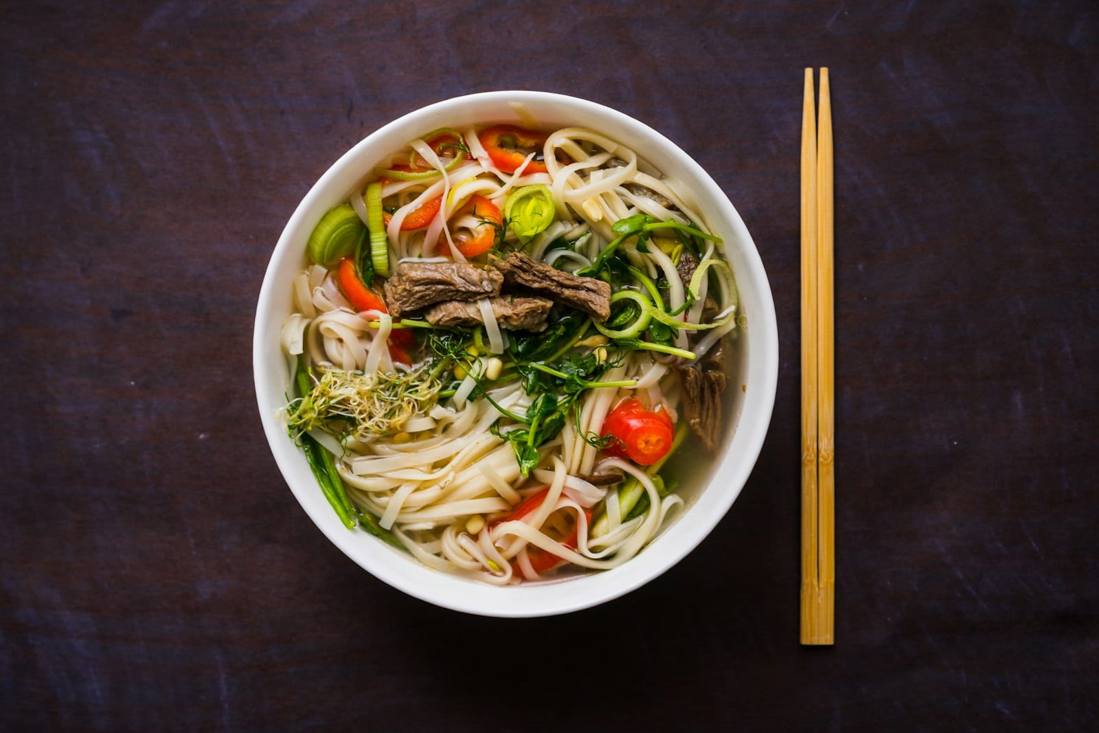 A bowl of Asian noodle soup