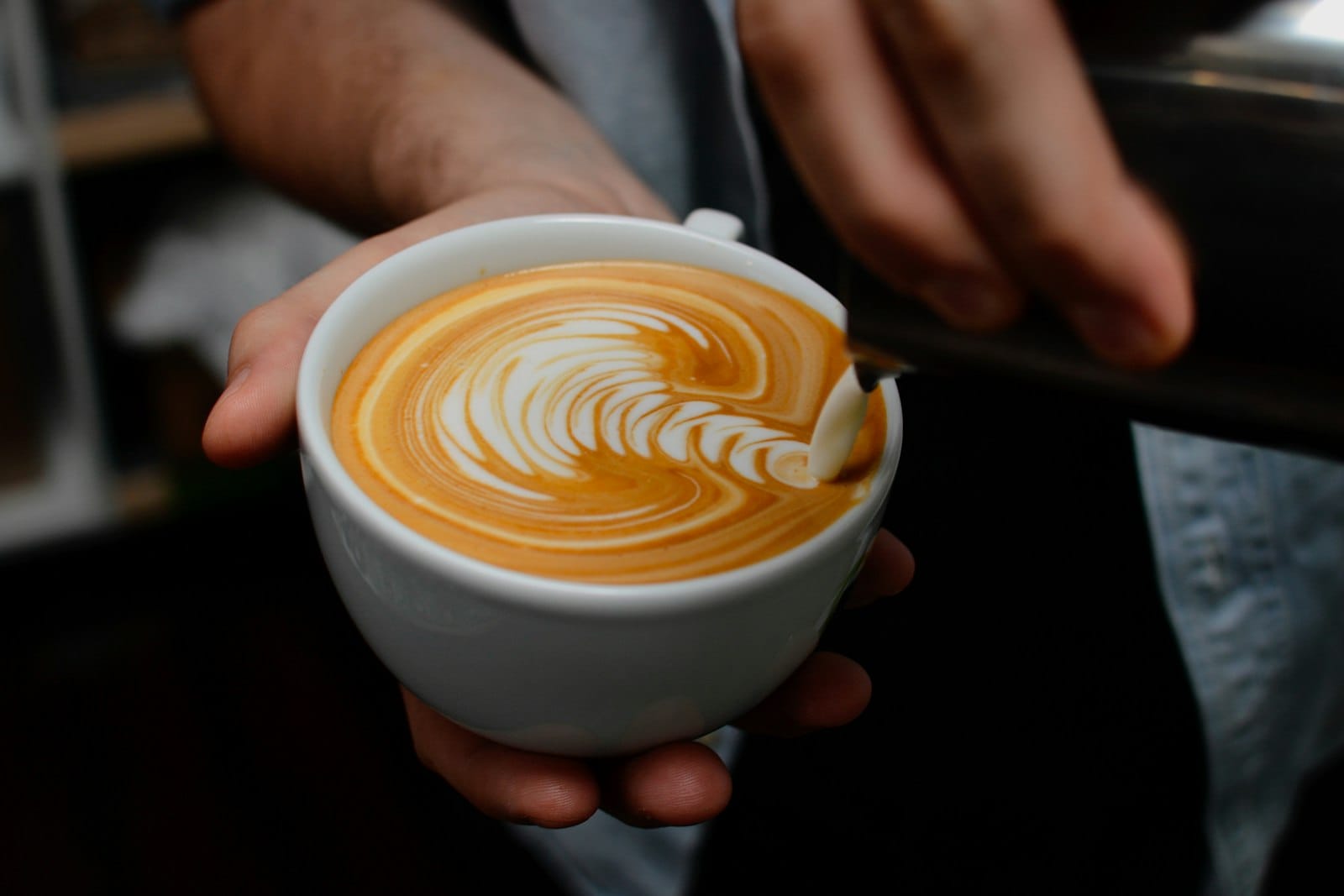 A plant-milk coffee with latte art