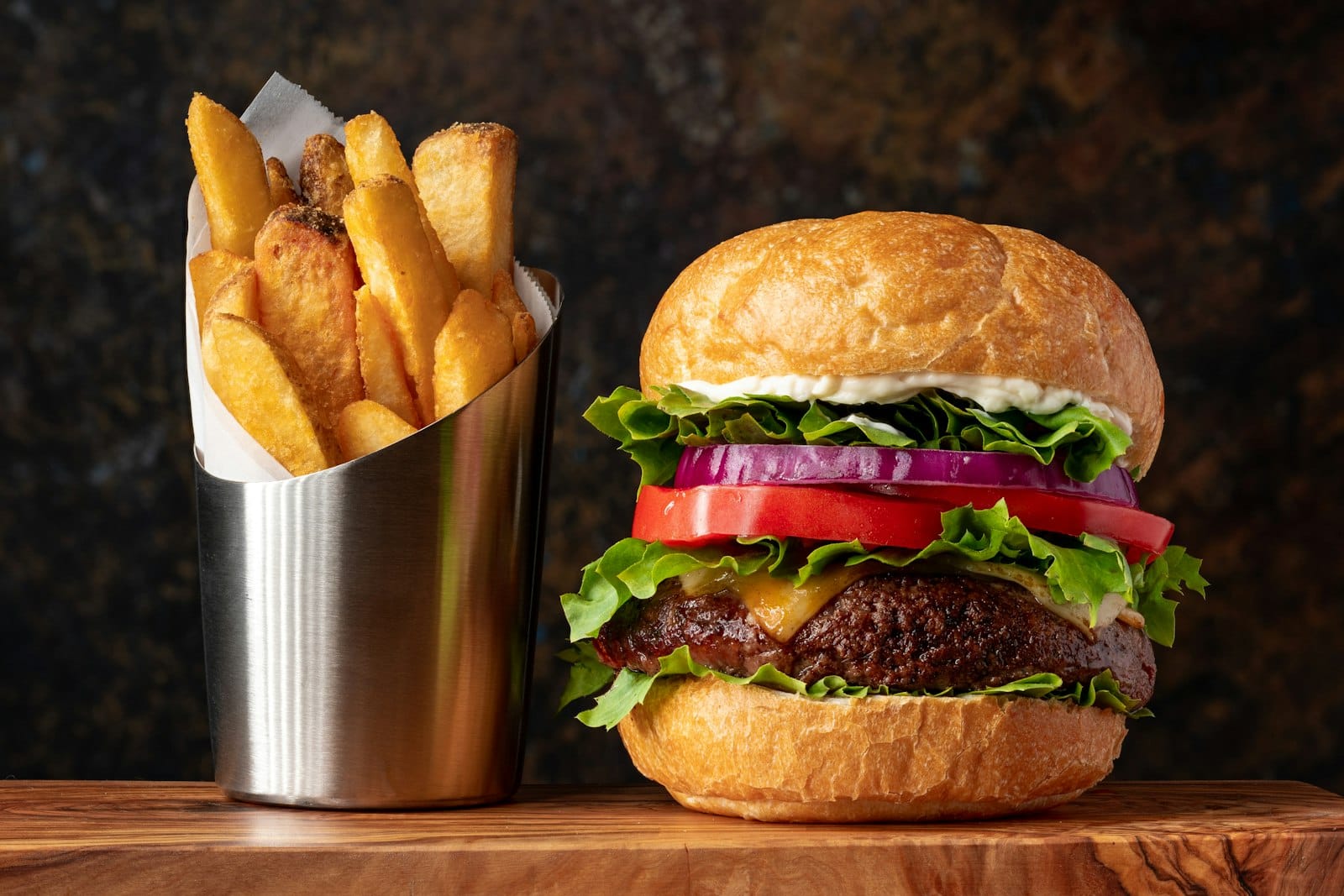 A plant-based burger with fries