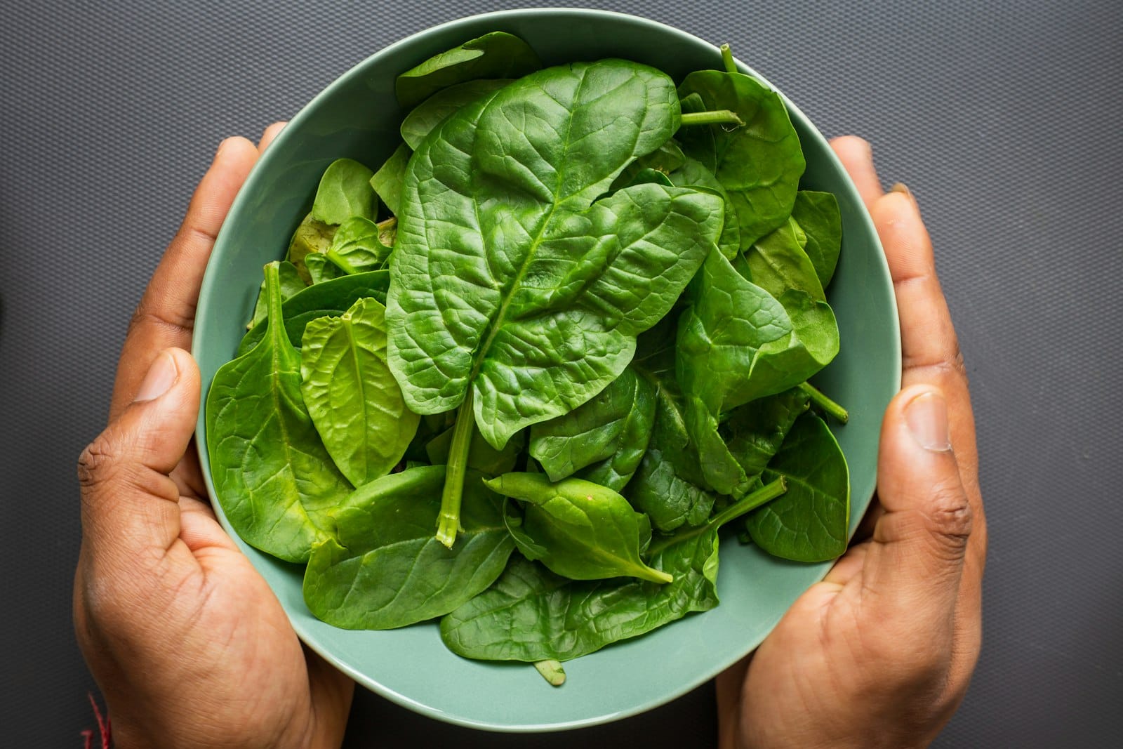 Iron-rich foods including spinach and lentils