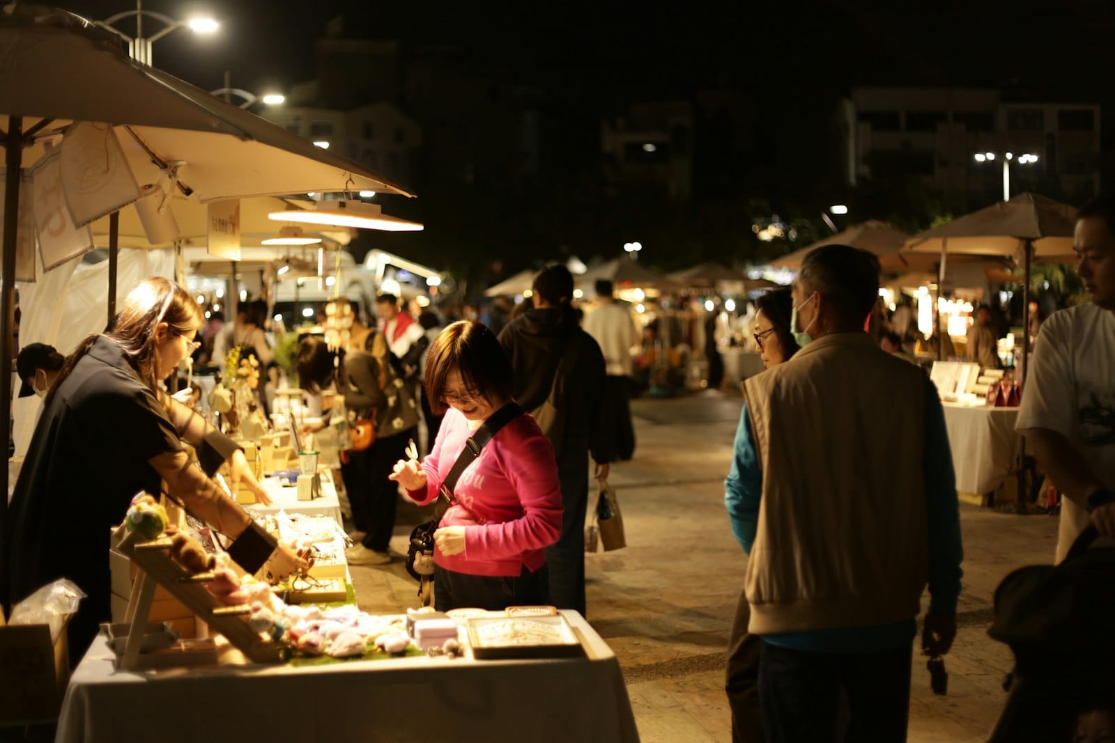 People browsing market stalls