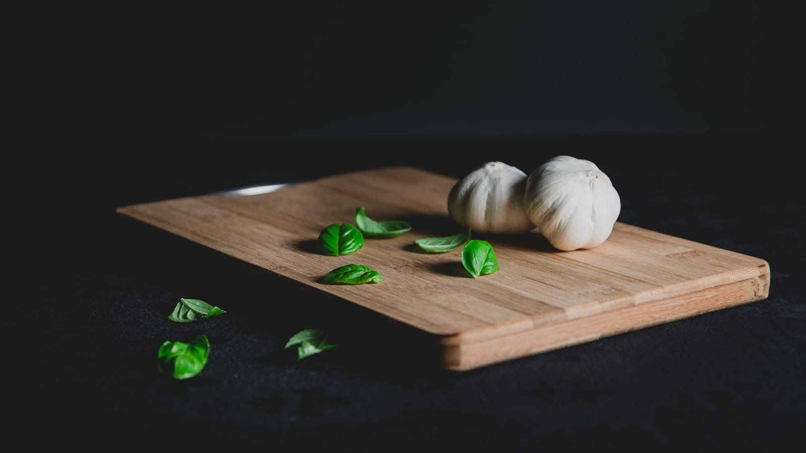 Vegetable scraps on a cutting board